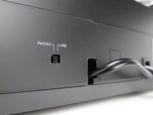 Qual é a diferença entre um pré-amplificador phono e um amplificador de potência?